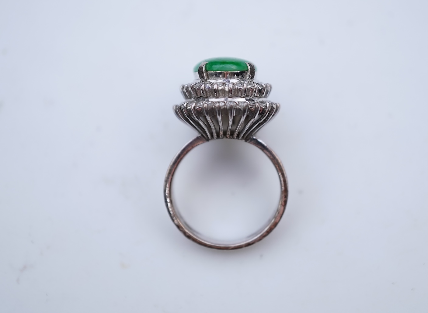 A jadeite and diamond ring
